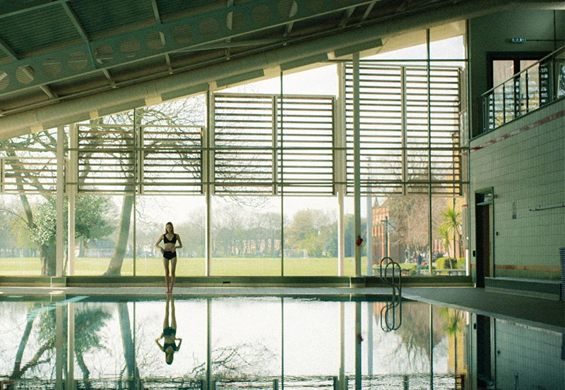 Georgia stood by the swimming pool