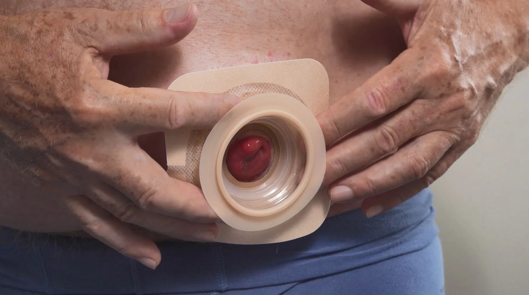 a person holding a plastic cup